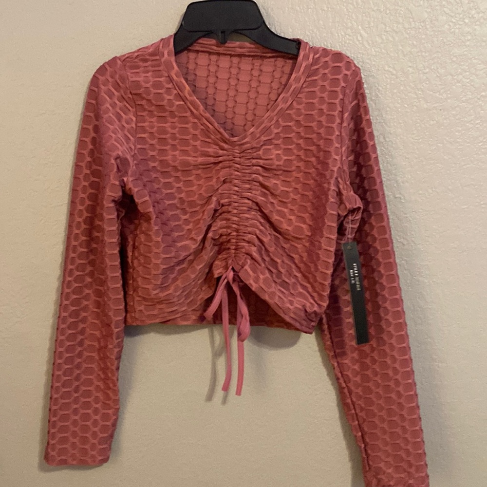 Pink ribbed long sleeve cropped top with adjustable ties
